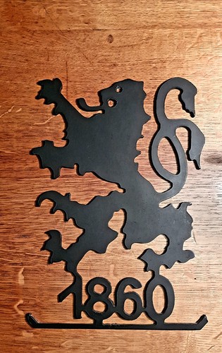 Schweres gusseisernes wandlogo - gusseisernes,